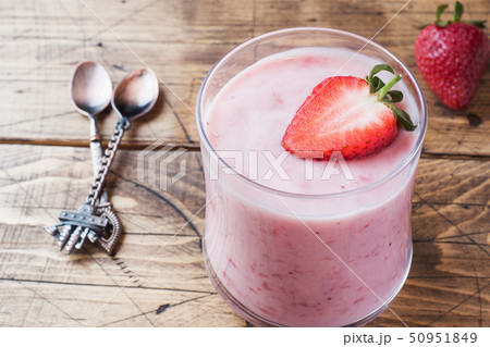 Homemade yogurt with fresh strawberries in glasses Homemade yogurt with fresh strawberries in glasses 50951849