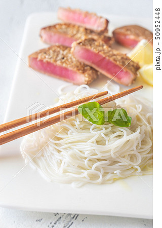 Rice noodles with fried tuna 50952448