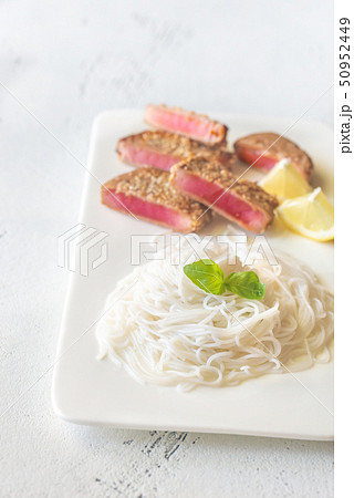 Rice noodles with fried tuna 50952449