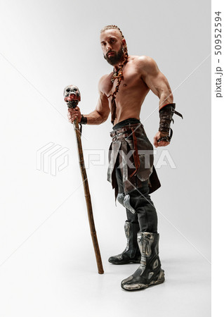 Man in leather viking's costume isolated on white studio background Man in leather viking's costume isolated on white studio background 50952594
