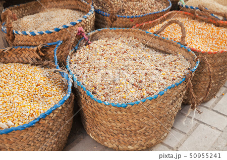 Dry corn and grains lie in baskets 50955241