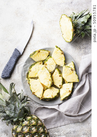 Sliced ripe pineapple on plate Sliced ripe pineapple on plate 50955781