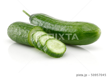 Fresh cucumber slices isolated on white Fresh cucumber slices isolated on white 50957045