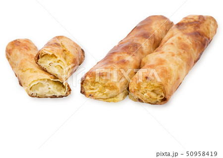 Baking puff pastry with potatoes and mushrooms, one pastry in the cut. Baking puff pastry with potatoes and mushrooms, one pastry in the cut. 50958419