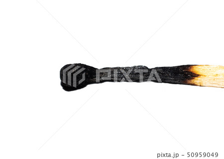Black head of a burnt match close up, isolated 50959049