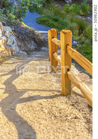 Wooden fence on downhill area in sunset Wooden fence on downhill area in sunset 50962902