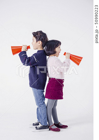 Cheerful boy and a girl on the white background 119 Cheerful boy and a girl on the white background 119 50990223
