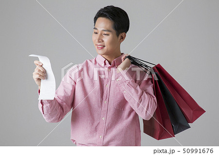 Attractive young man. sale, shopping, fashion, and style concept photo 503 Attractive young man. sale, shopping, fashion, and style concept photo 503 50991676