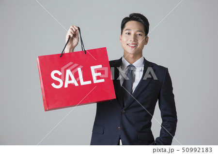 Attractive young man. sale, shopping, fashion, and style concept photo 320 Attractive young man. sale, shopping, fashion, and style concept photo 320 50992183
