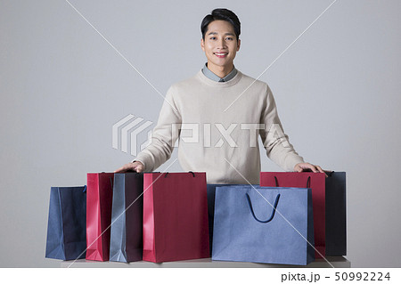 Attractive young man. sale, shopping, fashion, and style concept photo 239 50992224