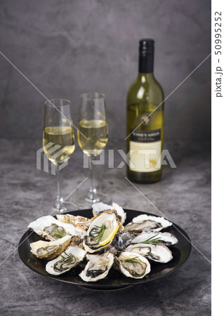 Close up of winter food ingredients Isolated on white background - salsify, oyster, mussel, shrimp and clam 067 Close up of winter food ingredients Isolated on white background - salsify, oyster, mussel, shrimp and clam 067 50995252