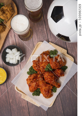 Korean style chicken and beer, delicious fried or spicy sauce chicken with cool beer 061 50996569