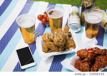 Korean style chicken and beer, delicious fried or spicy sauce chicken with cool beer 050 Korean style chicken and beer, delicious fried or spicy sauce chicken with cool beer 050 50996589