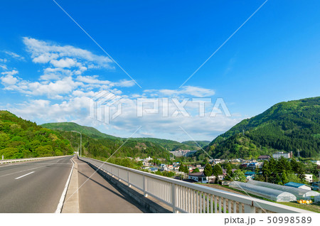 【青森県黒石市】春を迎えた黒石温泉郷と浅瀬石川ダム 50998589