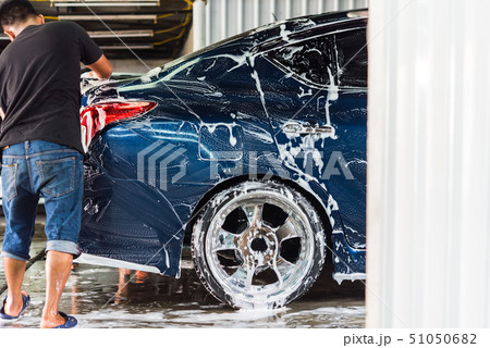 Cleaning the car (Car detailing) at car care shop 51050682