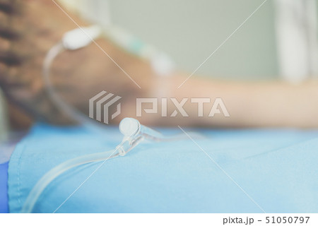 Patient with saline intravenous in the hospital 51050797