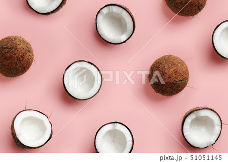 Pattern with ripe coconuts on pink background. Top View. Copy Space. Pop art design, creative summer 51051145