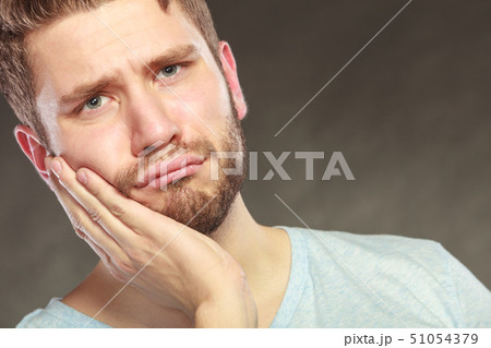 Man suffering from toothache tooth pain. Man suffering from toothache tooth pain. 51054379