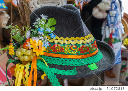 festive national hat with ribbons and feather in t 51072813