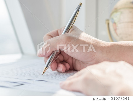 Applicant filling in company application form job 51077541