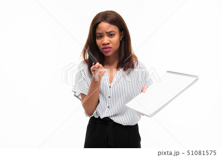 charming dark-skinned young girl explain smth on the plane table isolated on background 51081575