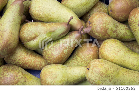 Green pears at a market 51100565