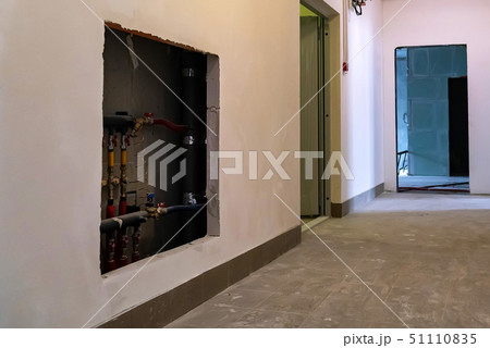 View of corridor of apartment building under construction View of corridor of apartment building under construction 51110835