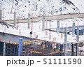 Top view snowy construction site with new appartment building 51111590