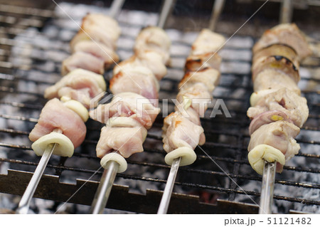 Cooking shish kebabs on the grill on the coals Cooking shish kebabs on the grill on the coals 51121482