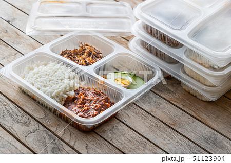 Conveniently packed delicious nasi lemak meal  51123904