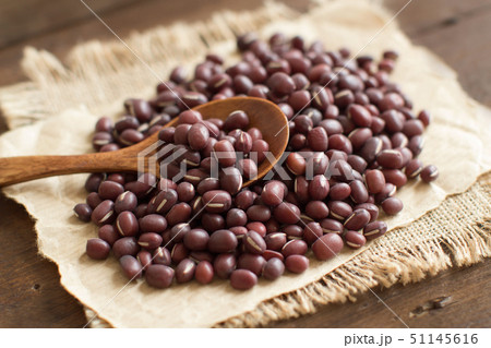 Uncooked azuki beans with a spoon 51145616