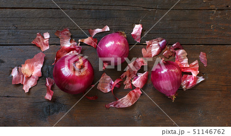 Red onions on a wooden table Red onions on a wooden table 51146762