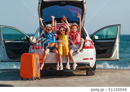 happy children girls friends sisters on the car happy children girls friends sisters on the car 51150048