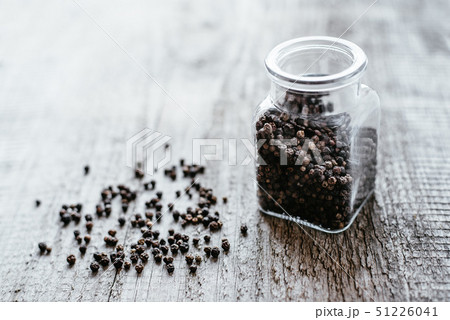 Black Pepper on wooden surface 51226041