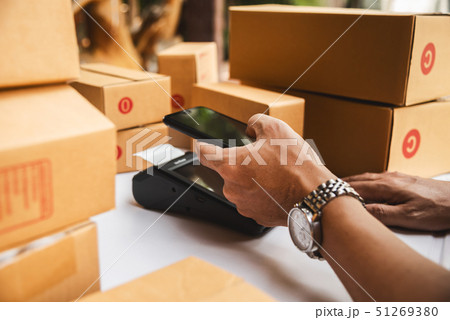 Man hand holding credit card reader nfc tecnology Man hand holding credit card reader nfc tecnology 51269380