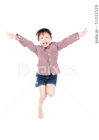 Portrait of happy little Asian child jumping 51311526