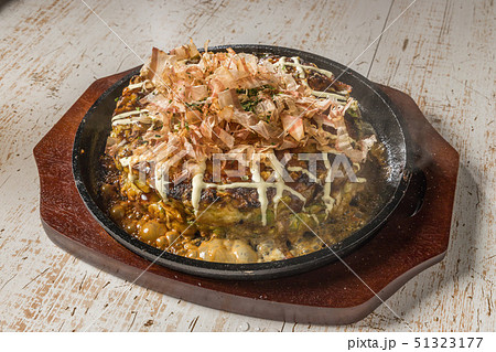 お好み焼き Okonomiyaki is a Japanese-style pancake お好み焼き Okonomiyaki is a Japanese-style pancake 51323177