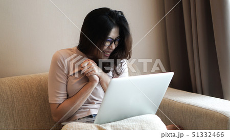 Asian freelamce woman work at home with computer Asian freelamce woman work at home with computer 51332466