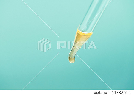 Glass pipette with oil essence close up Glass pipette with oil essence close up 51332619