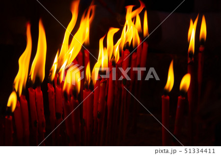 Chinese New Year, candle lighting to pay respect t 51334411