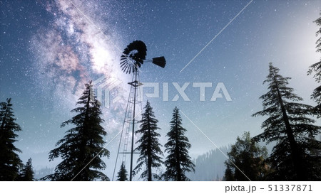retro windmill in mountain forest with stars. 51337871