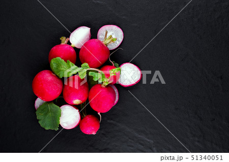 Red fresh radish on wooden 51340051