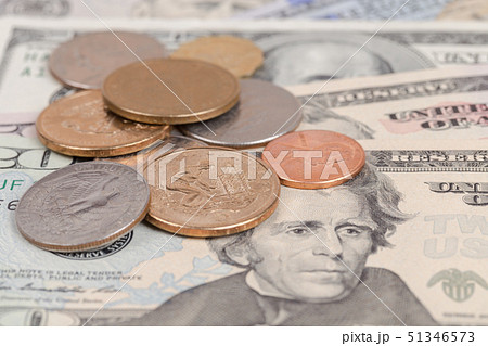 US coins on US banknotes close up US coins on US banknotes close up 51346573