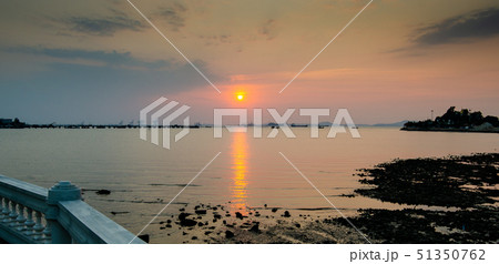 Sunset sky with island with low tide of sea 51350762