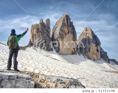 Hiker with backpacks on trail around the mountain Hiker with backpacks on trail around the mountain 51353146