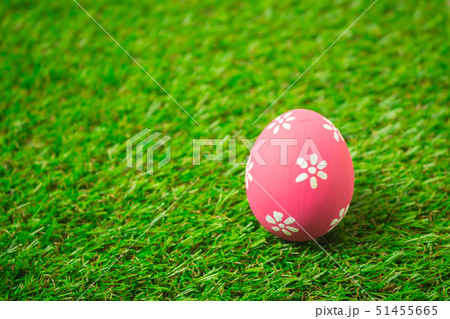 Easter eggs on the green grass. 51455665
