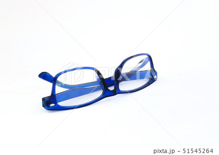 Close-up of blue glasses on white background. Close-up of blue glasses on white background. 51545264