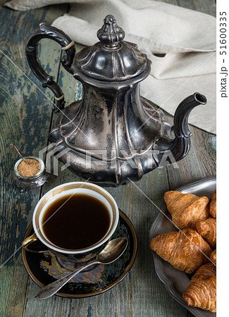 Coffee and croissants 51600335