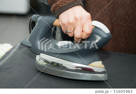 woman ironing clothe, close-up woman ironing clothe, close-up 51605963