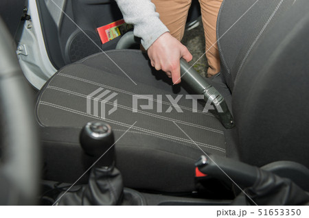 cleaning of the interior of the car with vacuum 51653350